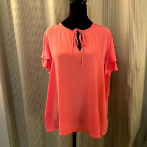Pink short sleeved blouse. Size XL, New York, and Company.